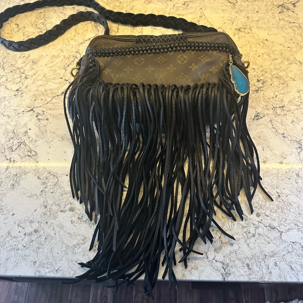 Louis Vuitton crossbody fringed bag